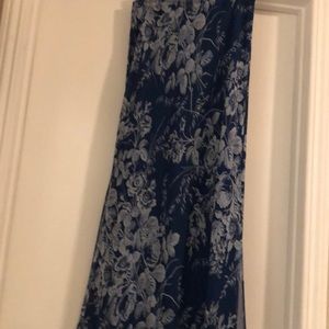 Long blue floral skirt with slits on each side.